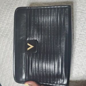 Valentino monogram embossed clutch